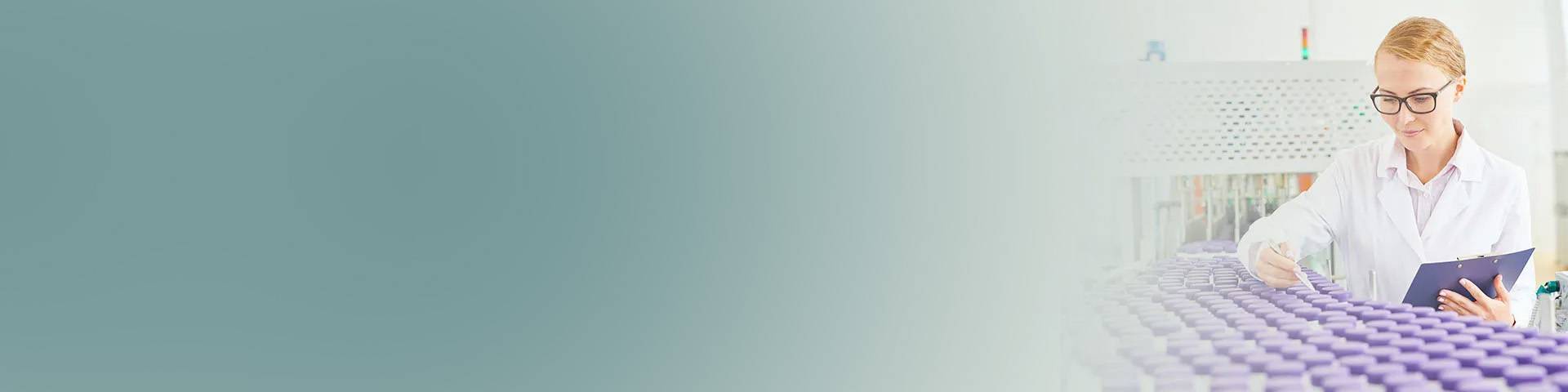 Food inspector checking yoghurt drinks for hygiene compliance