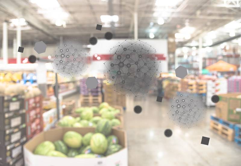 Blurred image of food in the background with an illustration of air pollution particles in the foreground.