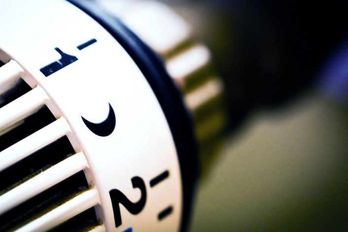 A close up of a radiator thermostat.