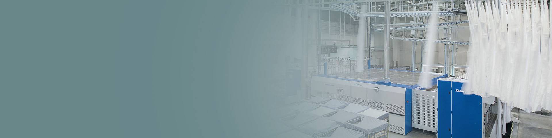 Textiles being cleaned in an industrial laundry service