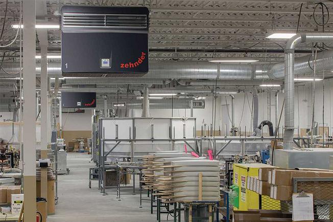 Industrial air purifier in a production hall.