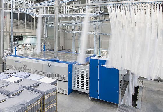Textiles being cleaned in an industrial laundry service