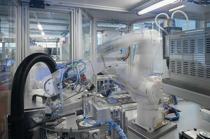 Bottles filled by a robot.